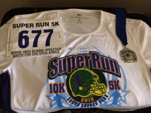 Shirt, bib and medal.